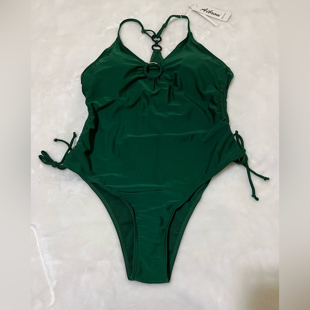 🆕 Green bathing suit.